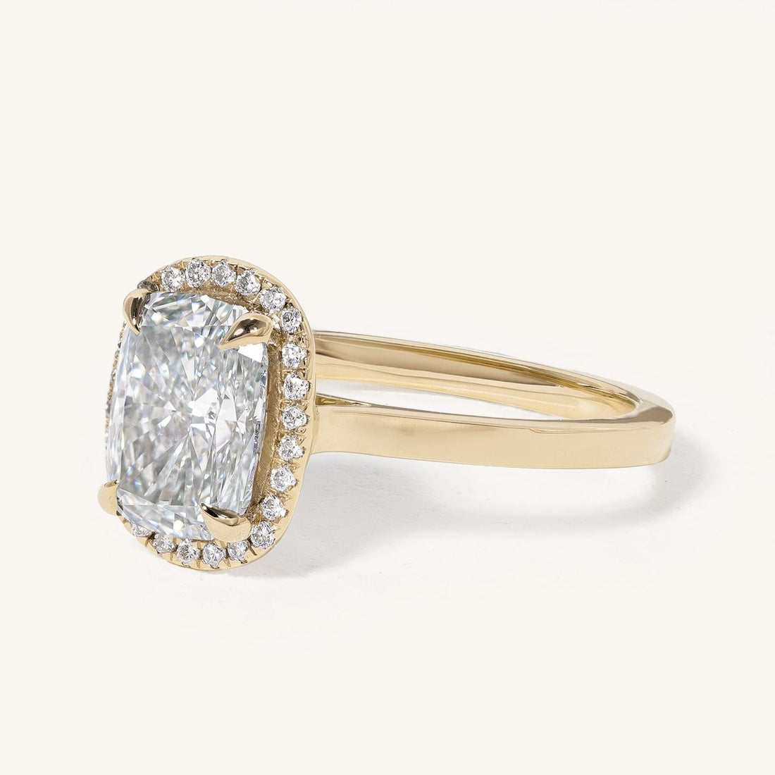 aideen_elongated_cushion_halo_cathedral_engagement_ring_01
