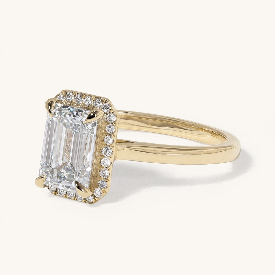 aideen_emerald_solitaire_halo_cathedral_engagement_ring_01