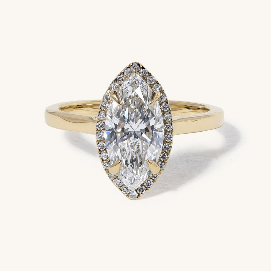 aideen_marquise_solitaire_halo_cathedral_engagement_ring_01