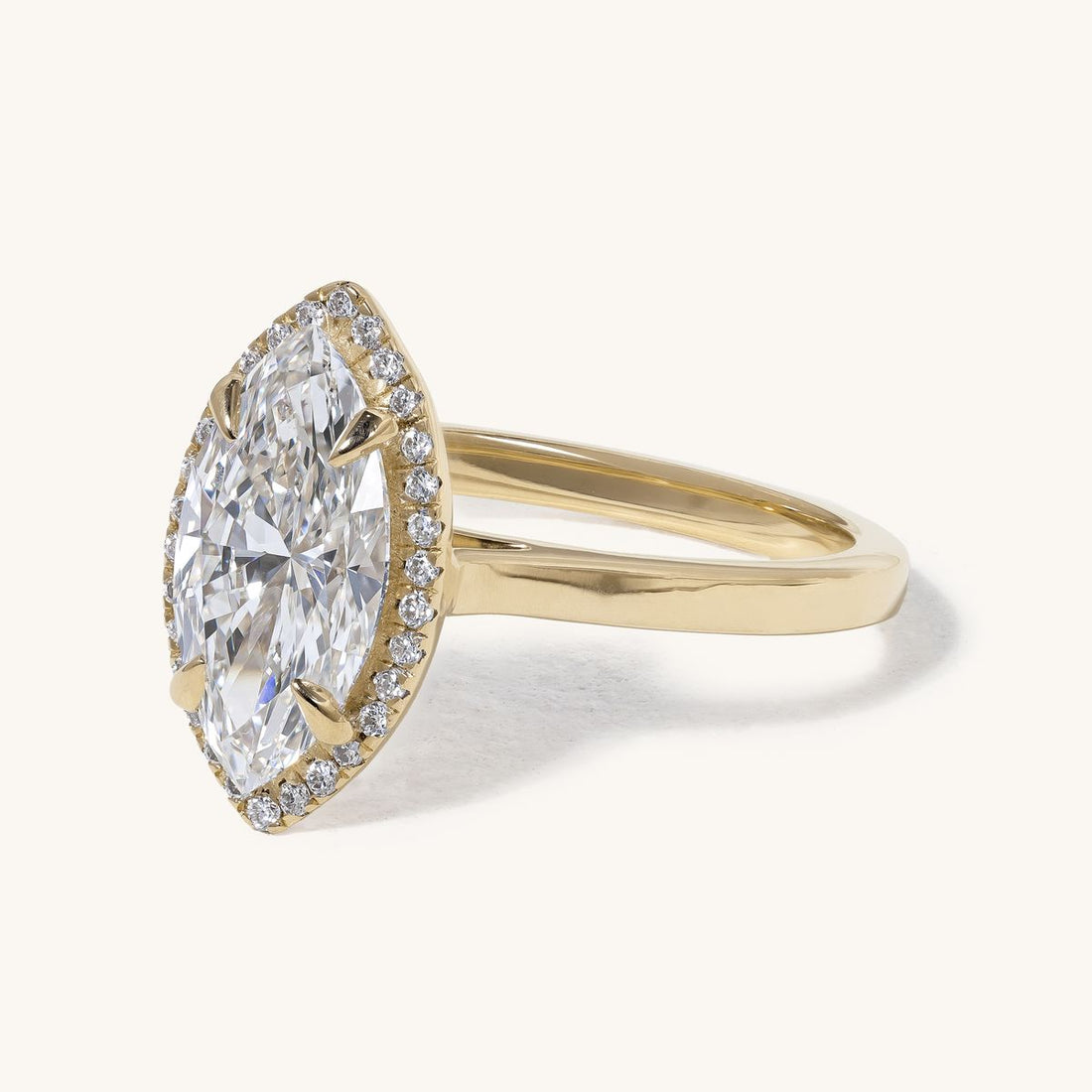 aideen_marquise_solitaire_halo_cathedral_engagement_ring_01