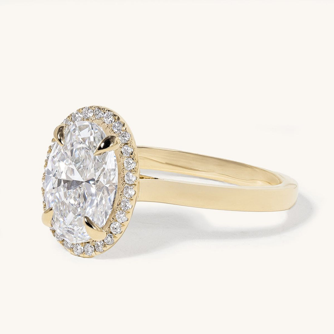 aideen_oval_claw_solitaire_halo_cathedral_engagement_ring_01