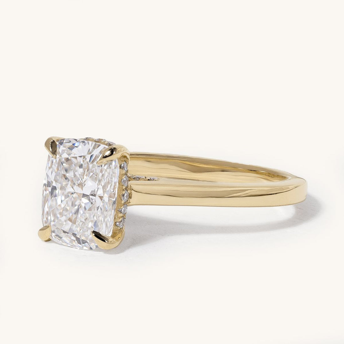 aixa_elongated_cushion_hidden_halo_engagement_ring_01