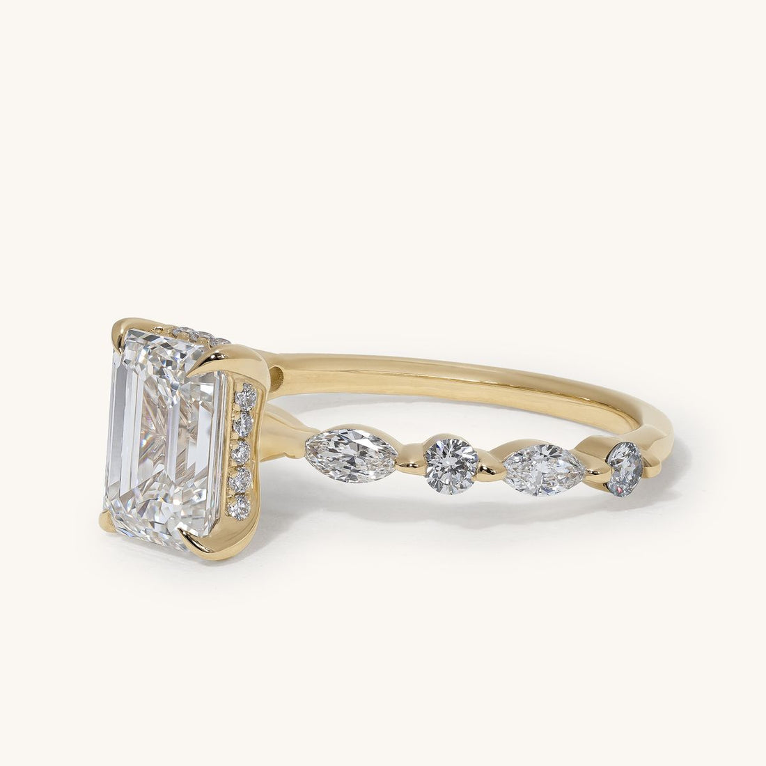 chelie_emerald_hidden_halo_marquise_accent_engagement_ring_01