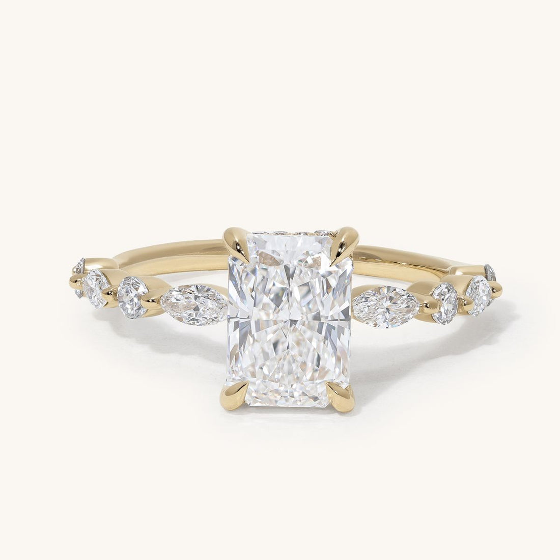 chelie_radiant_hidden_halo_marquise_accent_engagement_ring_01