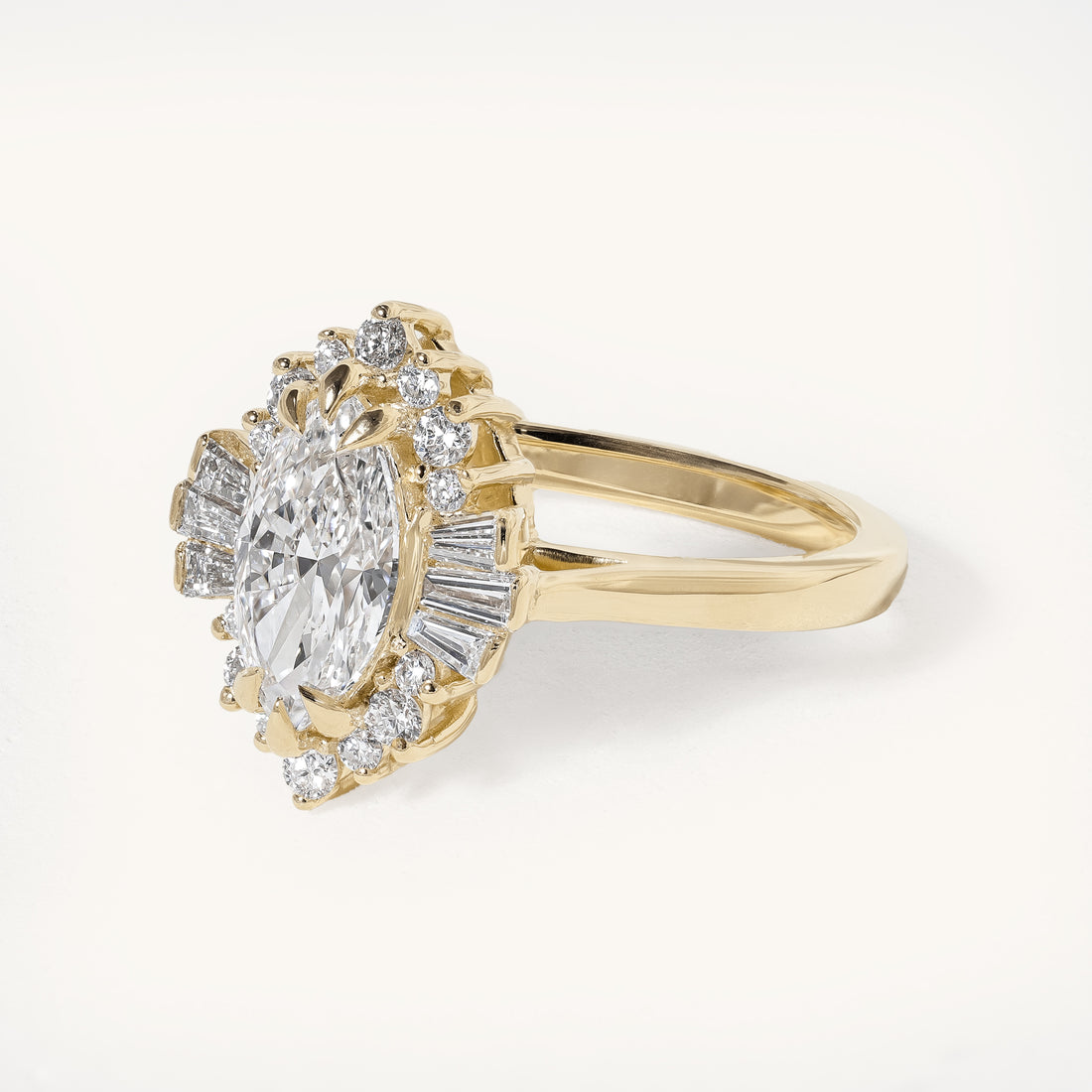 1ct Marquise Claw Solitaire with Tapered Baguette Fan Accents and Round Cluster Halo Engagement Ring