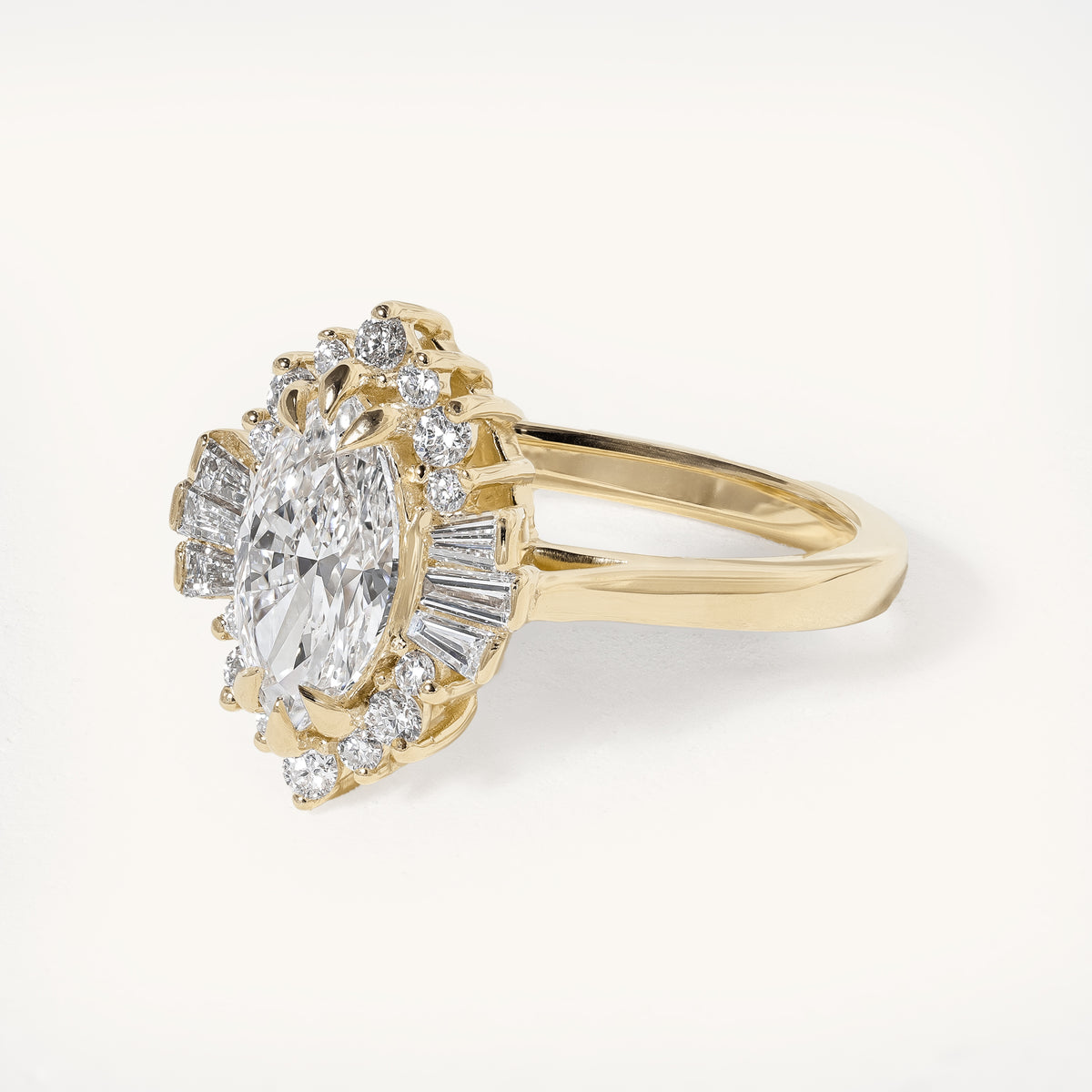 1ct Marquise Claw Solitaire with Tapered Baguette Fan Accents and Round Cluster Halo Engagement Ring