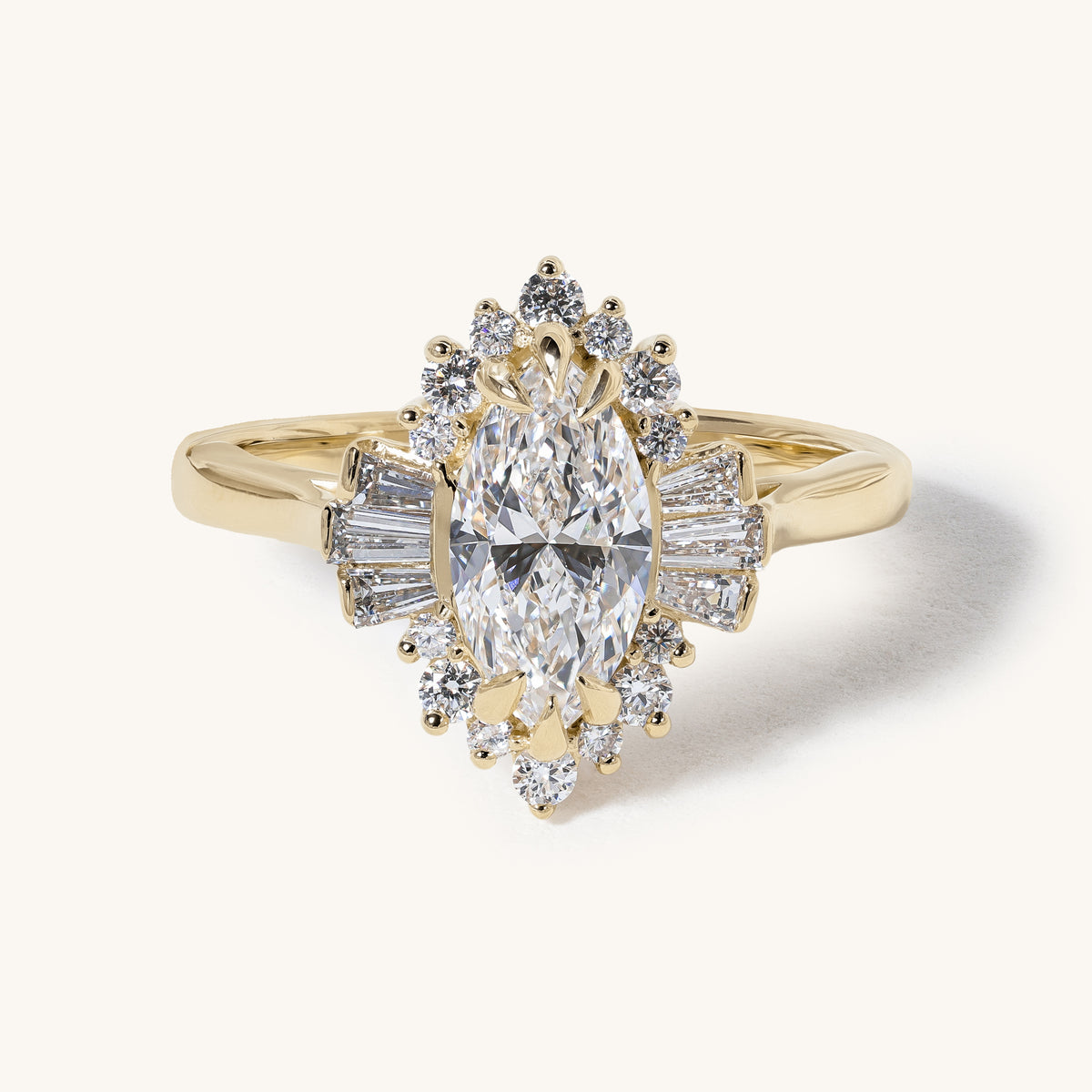 1ct Marquise Claw Solitaire with Tapered Baguette Fan Accents and Round Cluster Halo Engagement Ring