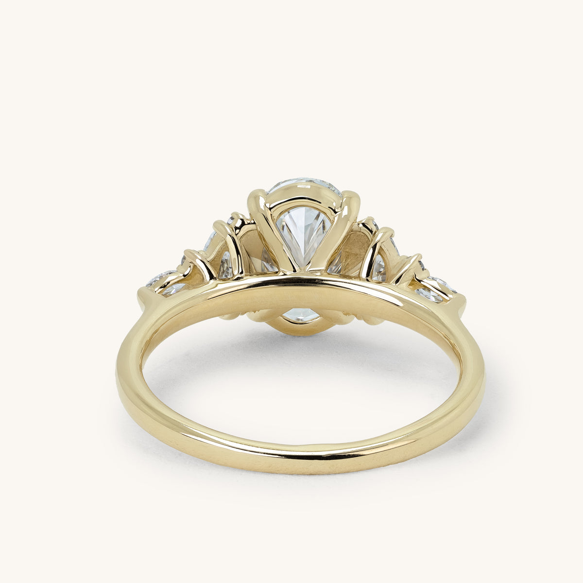 1.54ct Oval Claw Solitaire with Clustered Round-Marquise Side Stones and Cathedral Engagement Ring