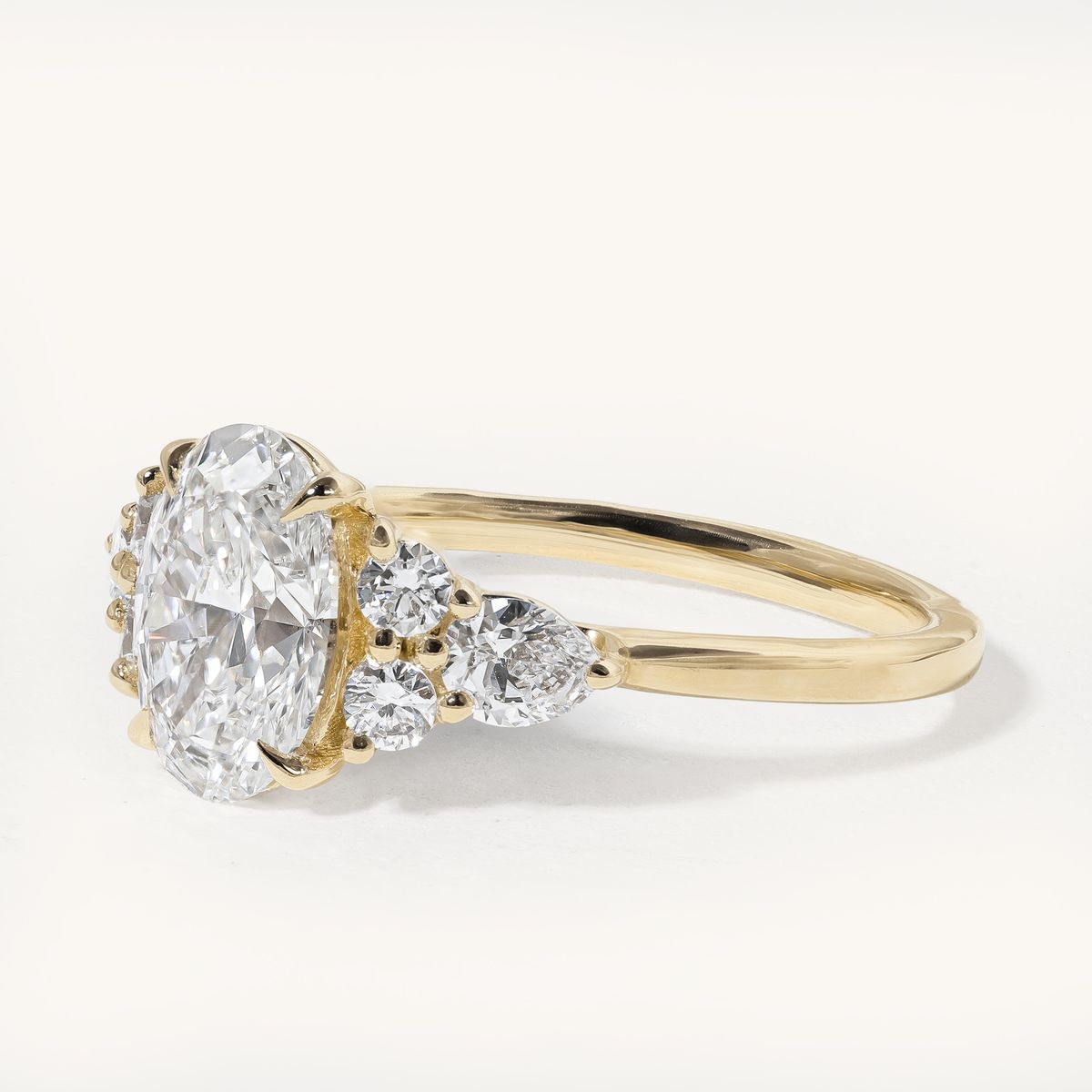 hendrix_oval_cathedral_cluster_shoulders_engagement_ring_02