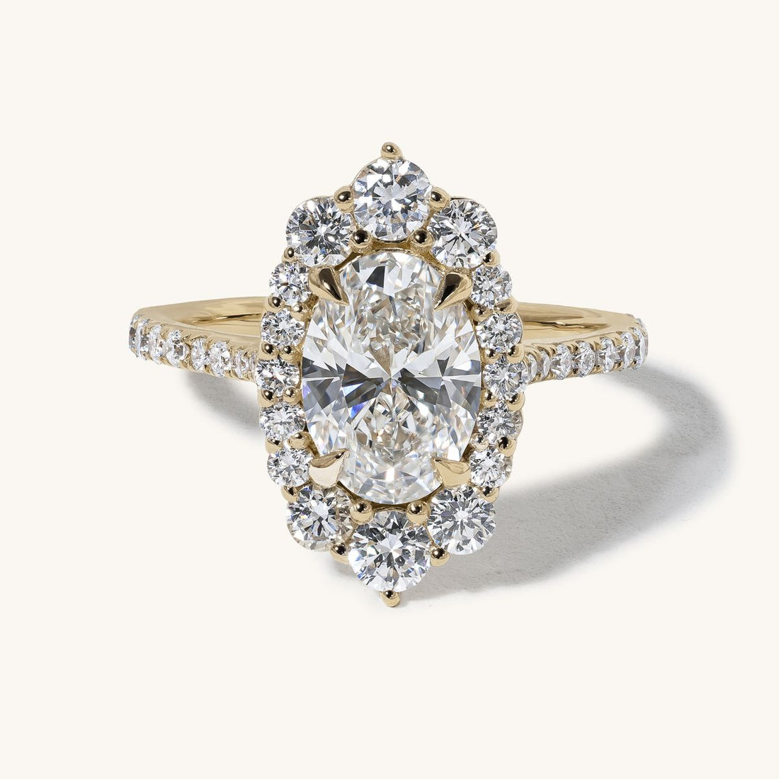 joncie_oval_graduated_halo_pave_cathedral_engagement_ring_01