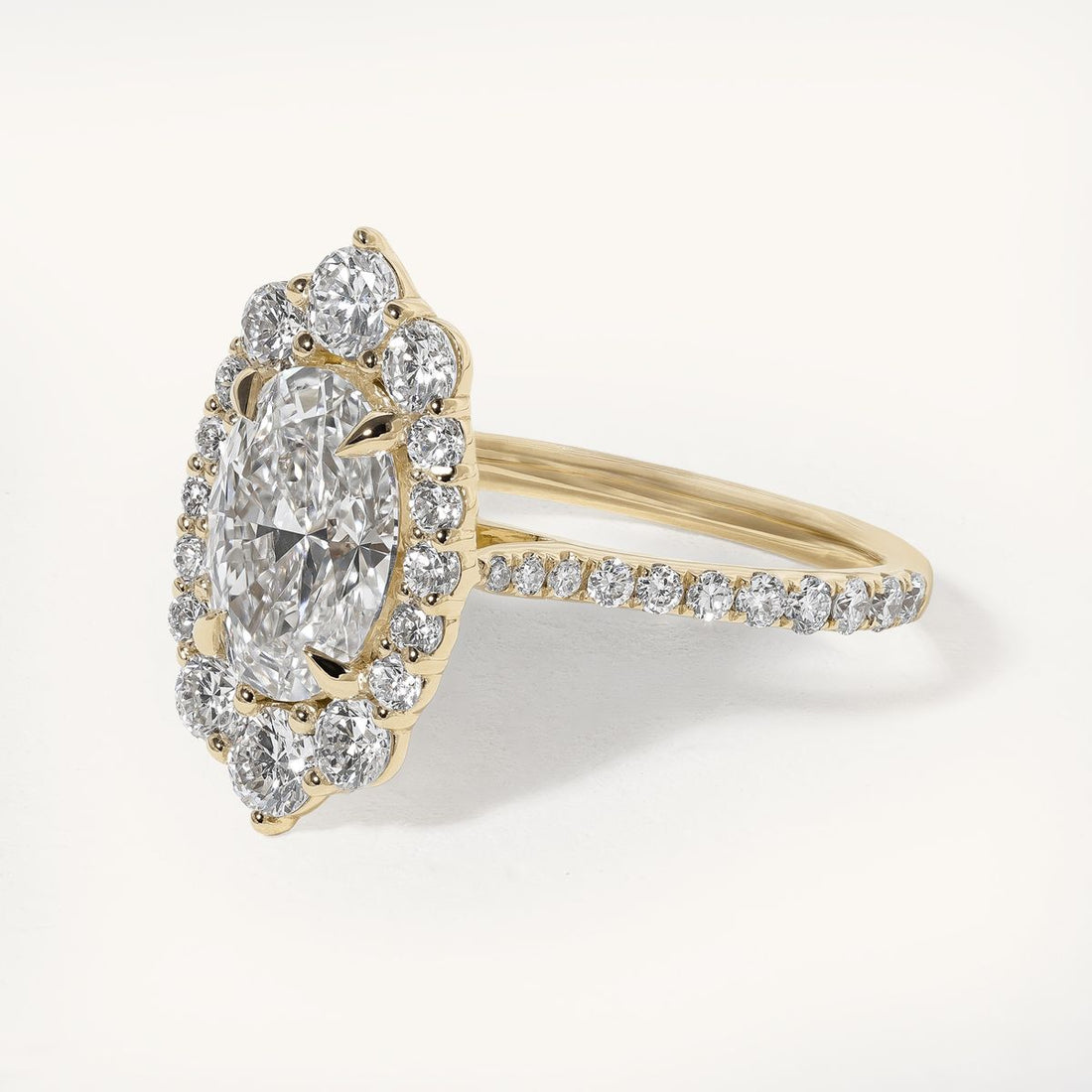 joncie_oval_graduated_halo_pave_cathedral_engagement_ring_01