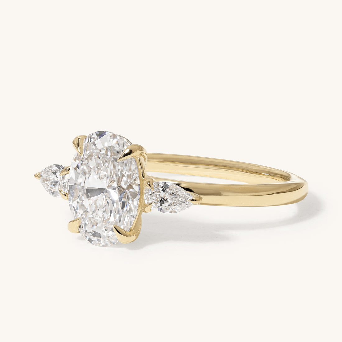 1.51ct Oval Claw Trilogy with Pear Side Stones Engagement Ring