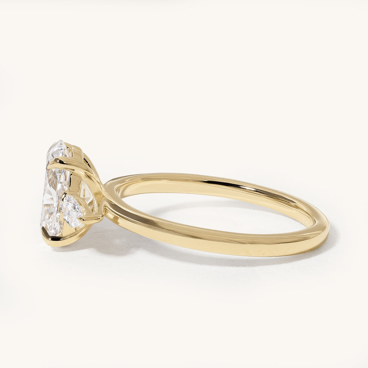 1.51ct Oval Claw Trilogy with Pear Side Stones Engagement Ring