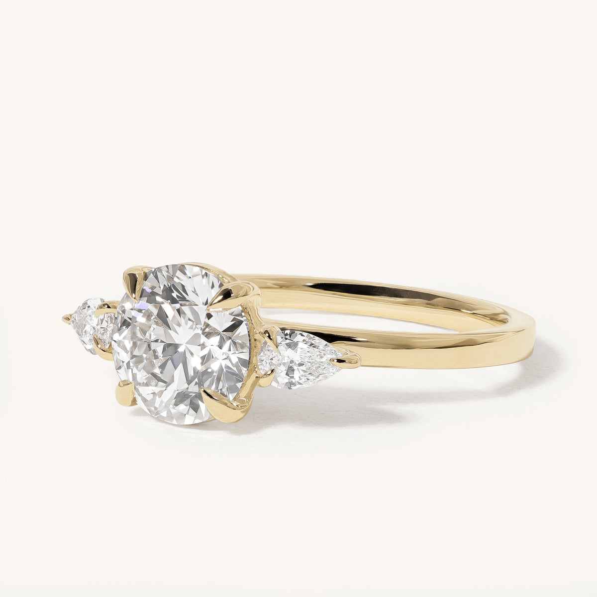 1.51ct Round Claw Trilogy with Pear Side Stones Engagement Ring