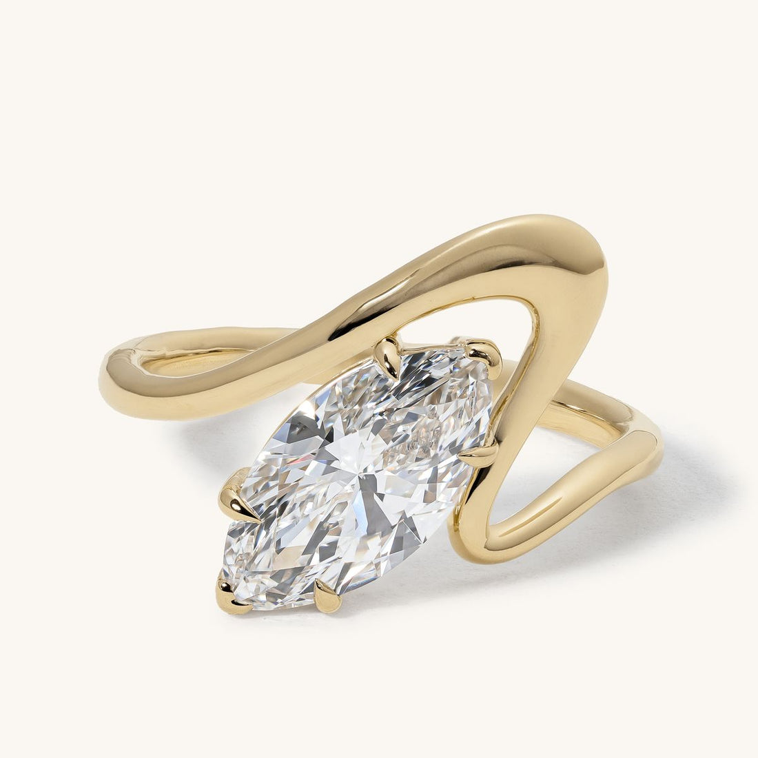 kellen_east_west_marquise_bypass_wave_band_engagement_ring_01