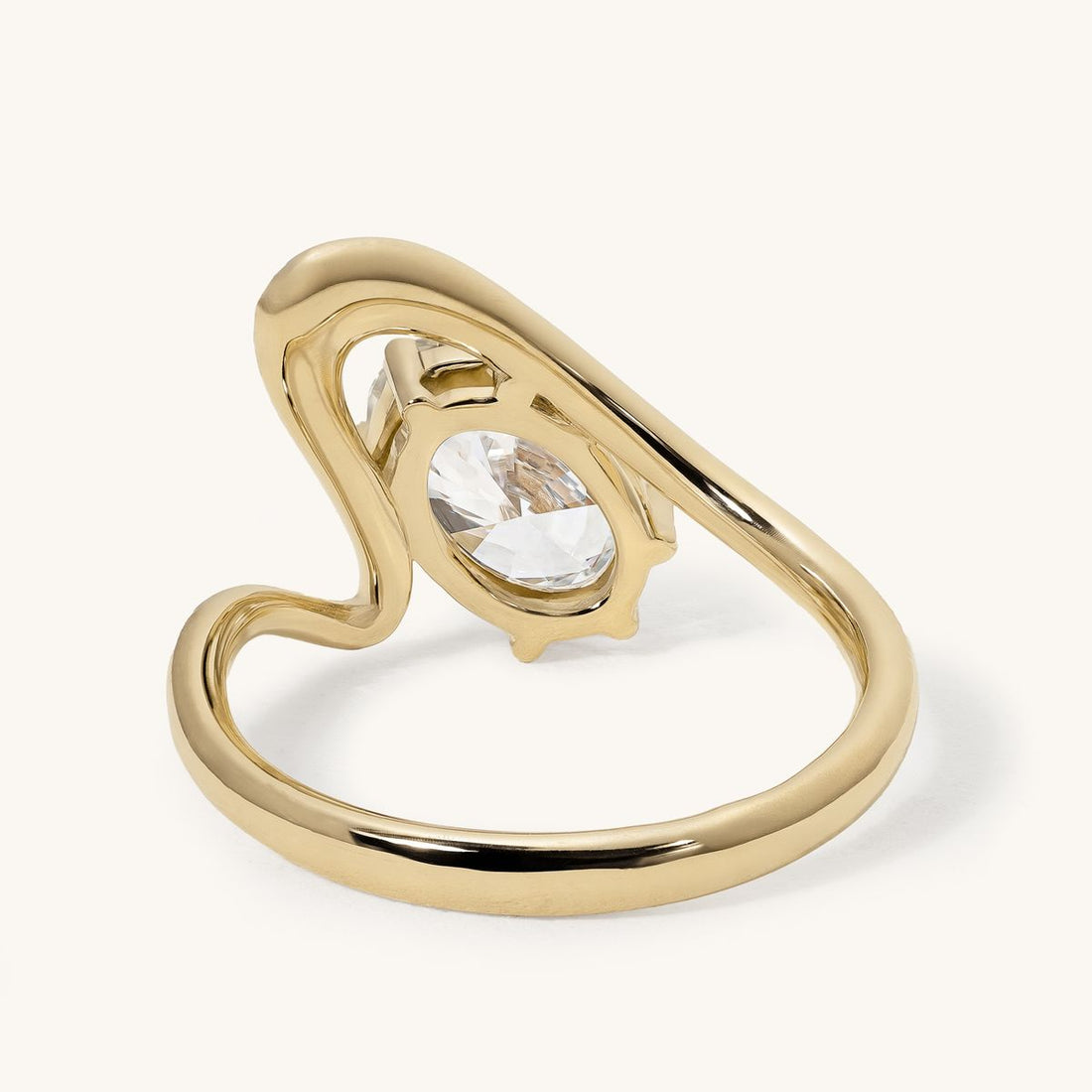 kellen_east_west_oval_bypass_wave_band_engagement_ring_03