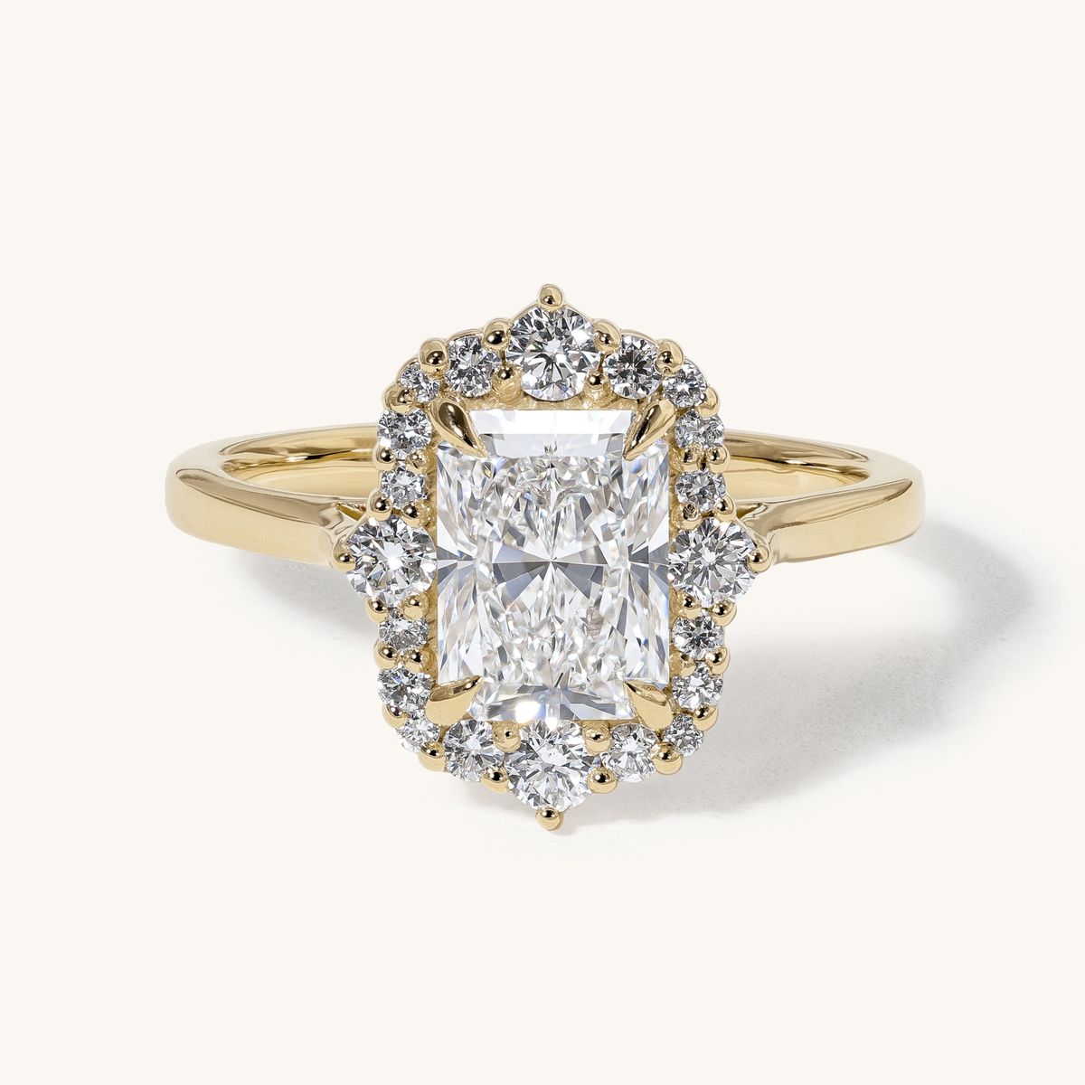 nayora_radiant_graduated_halo_cathedral_engagement_ring_01