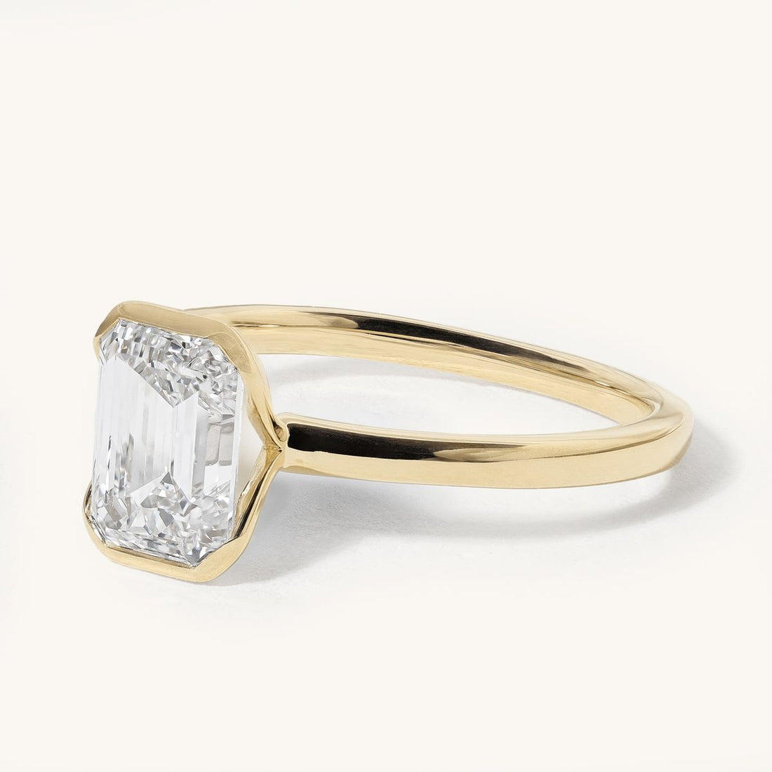 nonnie_emerald_half_bezel_solitaire_lab_grown_diamond_ring_01