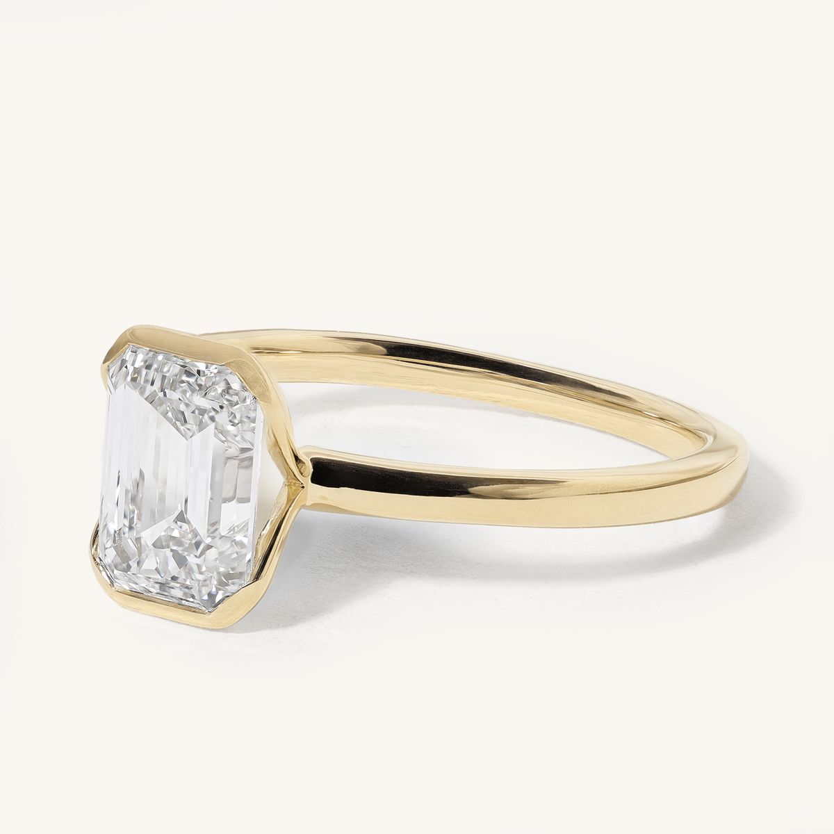 nonnie_emerald_half_bezel_solitaire_lab_grown_diamond_ring_02