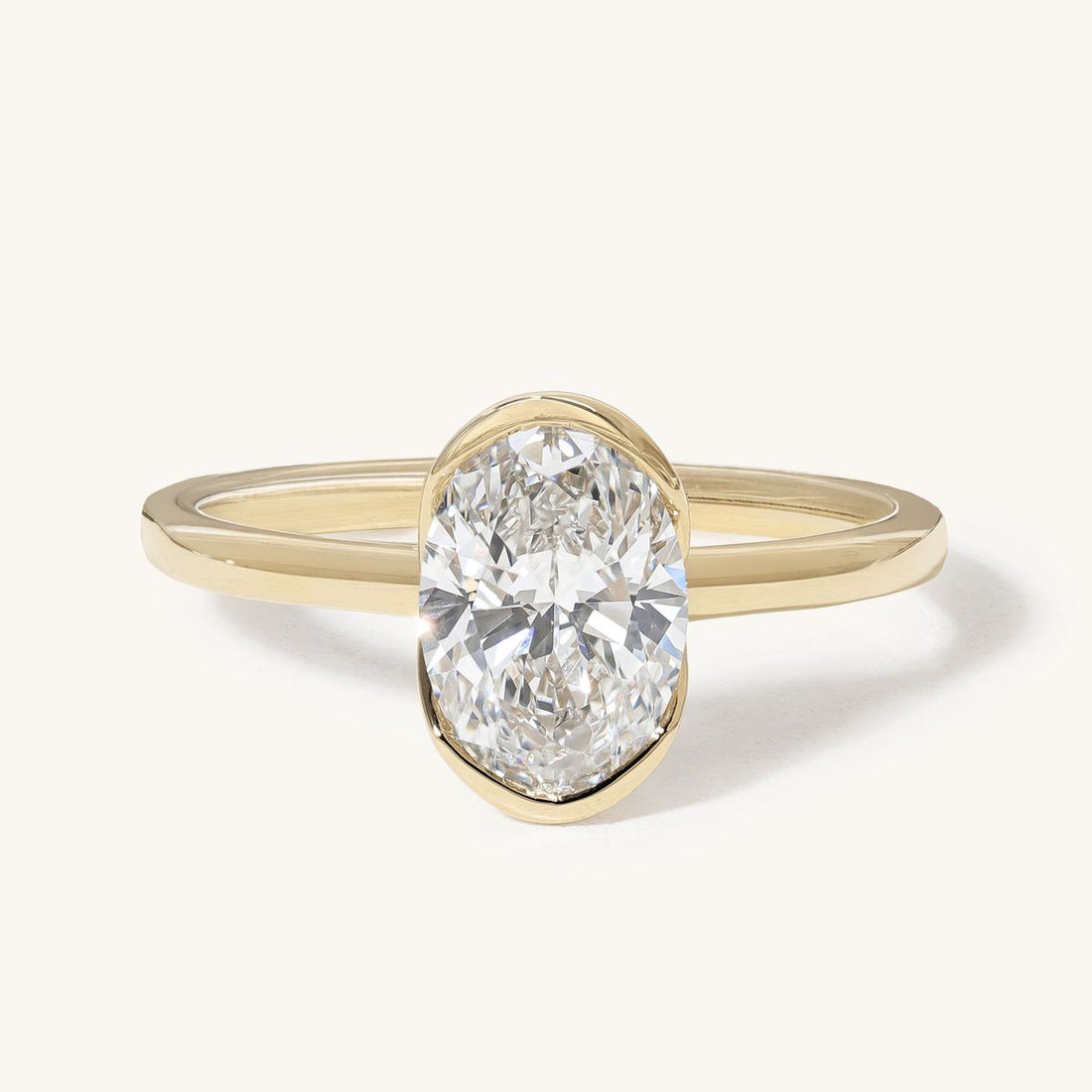 nonnie_oval_half_bezel_solitaire_lab_grown_engagement_ring_01